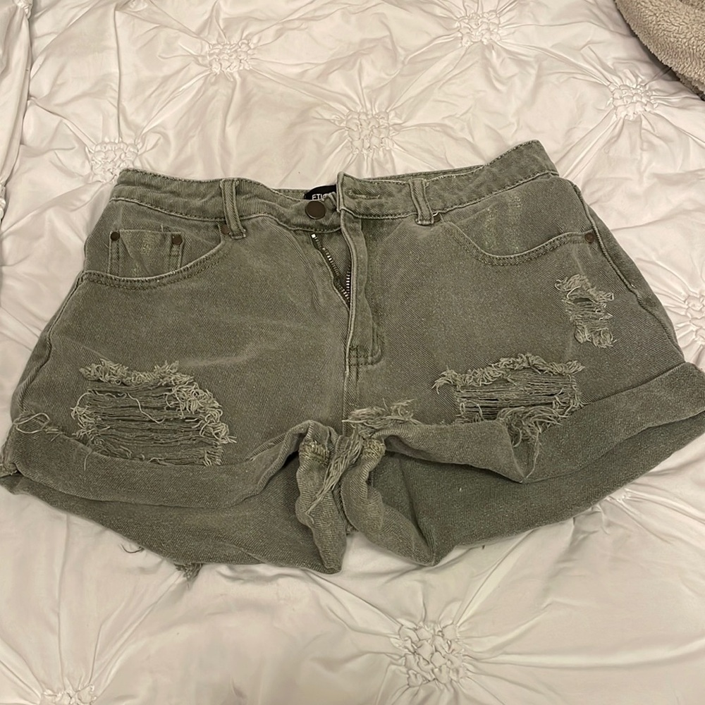 green jean shorts